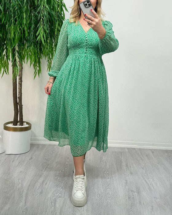 Elegante jurk met knopen en print