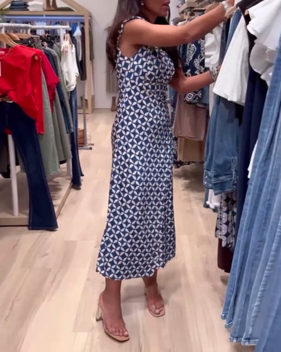 Mouwloze, elegante jurk met geometrische print en ronde hals