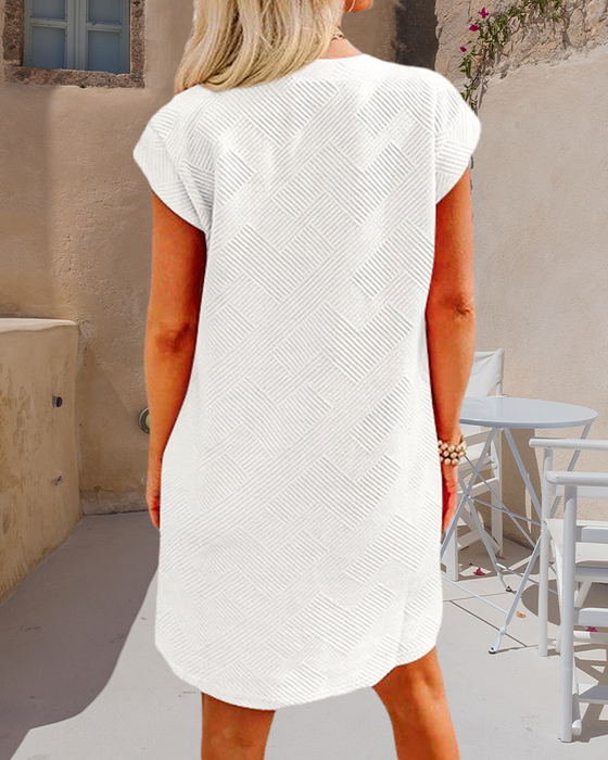 Jurk met ronde hals, zak en korte mouwen