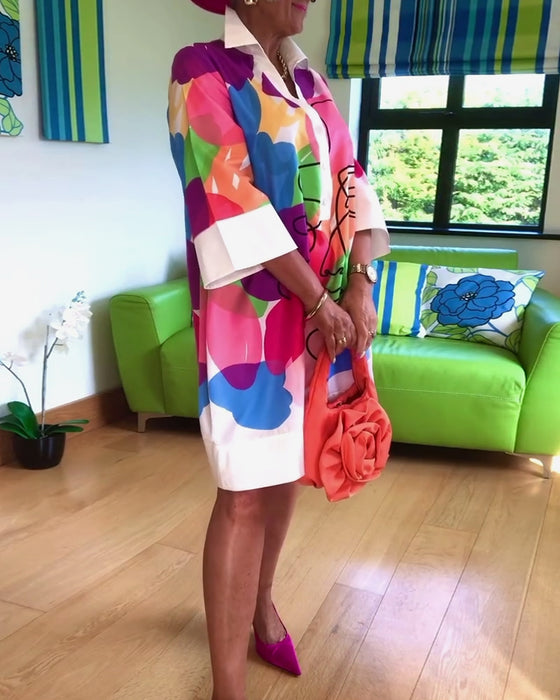 Jurk met reverskleurige portretprint