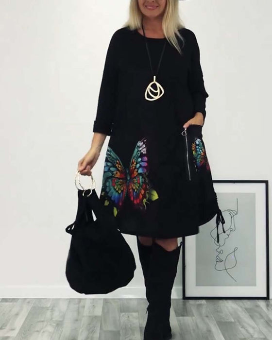 Vlinderprint jurk met lange mouwen en zakken