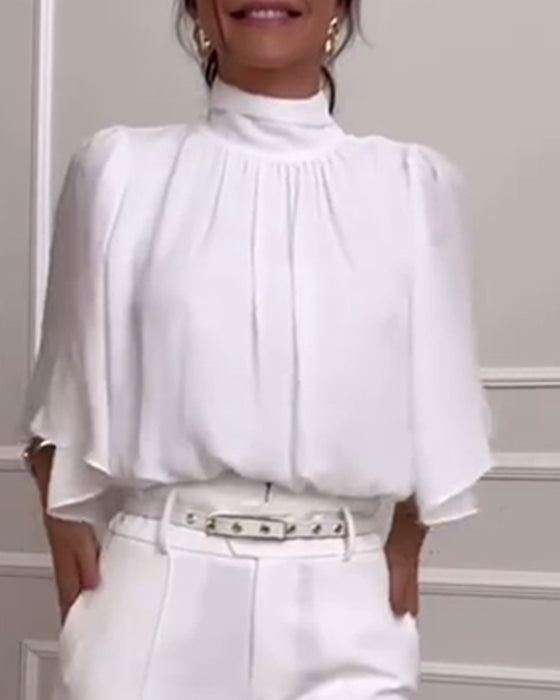 Effen blouse met hoge kraag en vlindermouwen