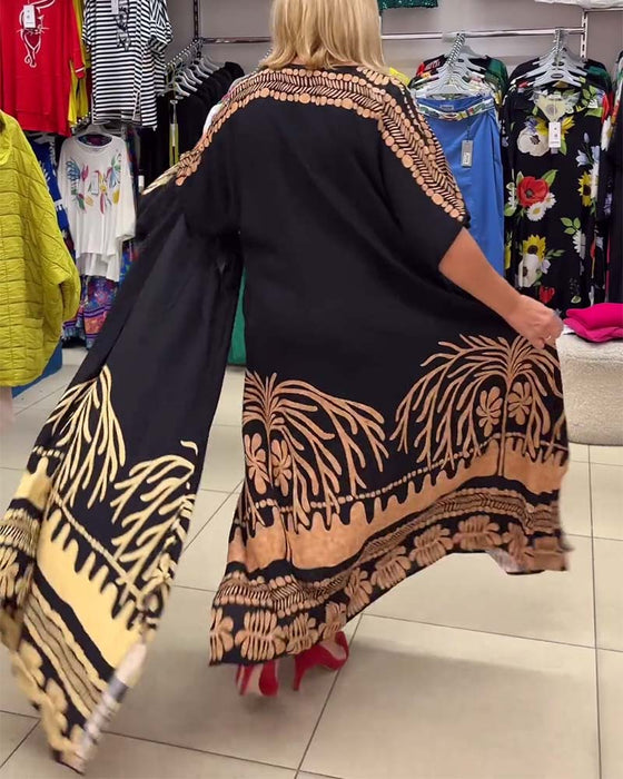 Losse jurk met ronde hals, korte mouwen en veters met print