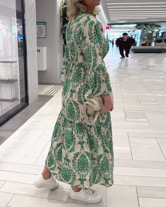 Jurk met trekkoord en klokmouwen met print