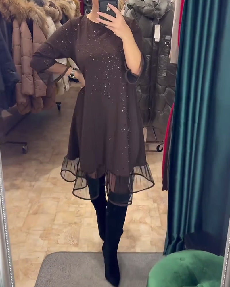 Stijlvolle jurk met ronde hals en glinsterende mesh