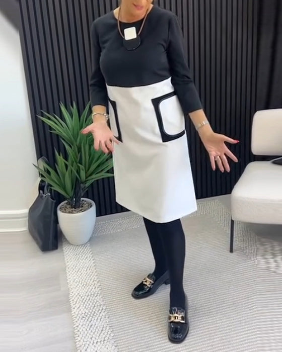 Casual contrasterende jurk met ronde hals en zak