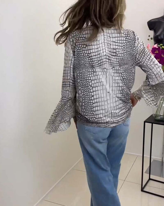 Blouse met bloemmotief en koord