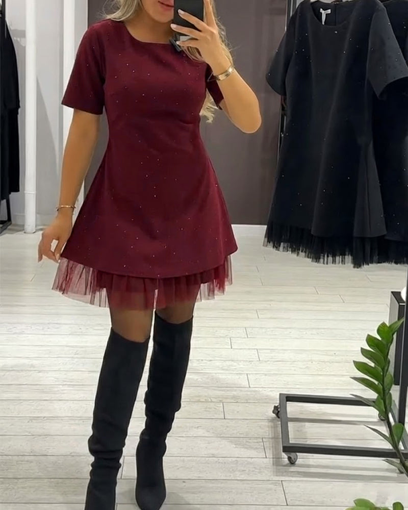 Elegante jurk met glinsterende mesh-patchwork