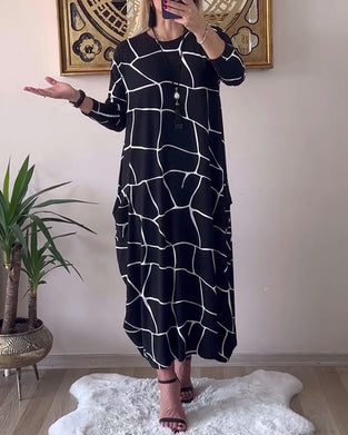 Jurk ronde hals lange mouw zak los