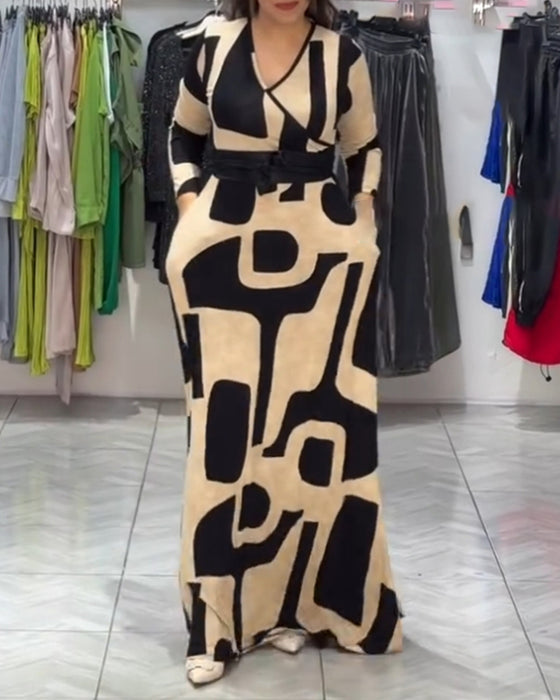 Elegante geprinte jurk met V-hals en lange mouw