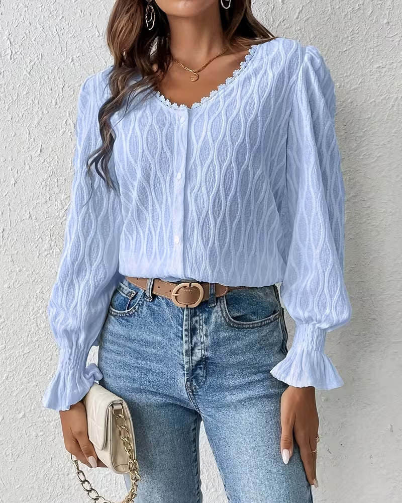 Elegante blouse met jacquard en ruchesmouw