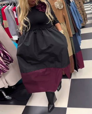 Elegante jurk met contrasterende splitten