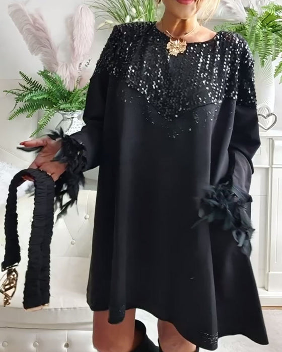 Modieuze Wijde Jurk Met Pailletten En Patchworkdetails