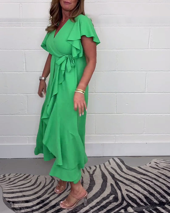 Elegante jurk met ruches, effen kleur en split