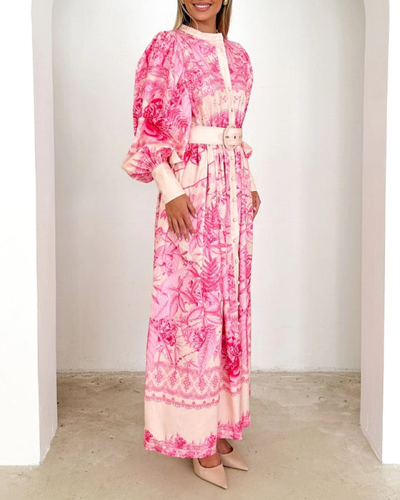 Jurk met knoopjesprint en lantaarnmouwen