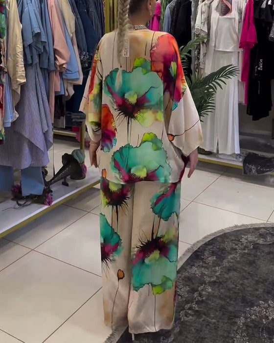 Set met driekwart mouwen met lotusprint en één schouder