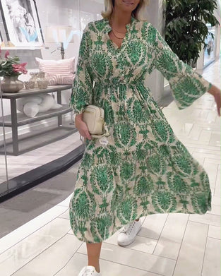 Jurk met trekkoord en klokmouwen met print