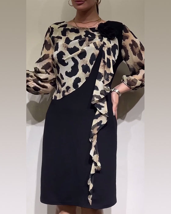 Elegante patchworkjurk met luipaardprint