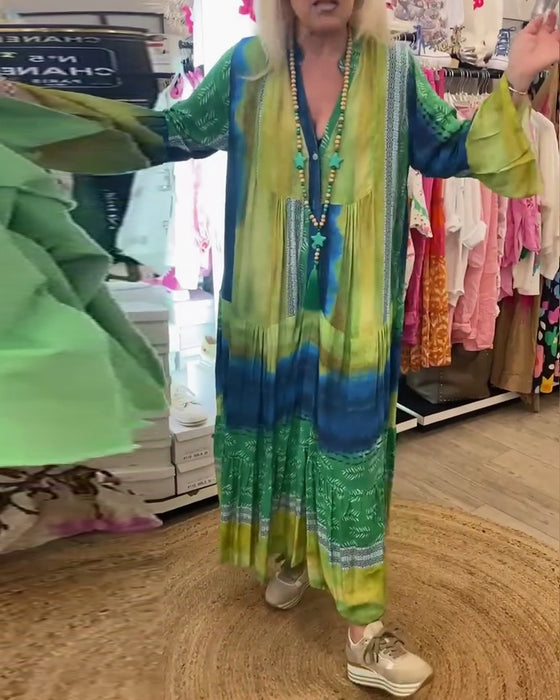 Casual lange jurk met V-hals, uitlopende mouwen en print