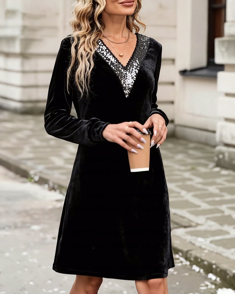 Elegante jurk met V-hals en pailletten