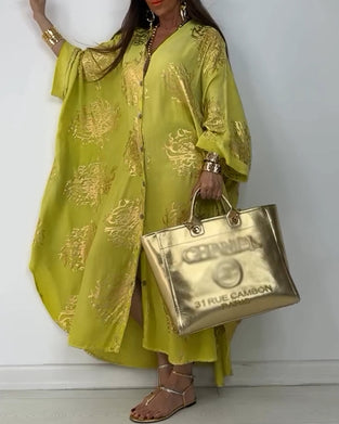 Losse jurk met lange mouwen en knoopsluiting