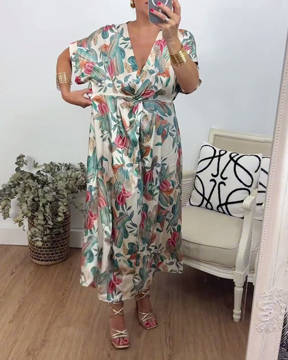 Elegante jurk met v-hals en botanische print