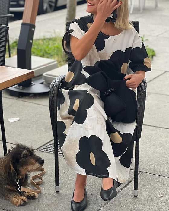 Losse jurk met bloemenprint, ronde hals en zak