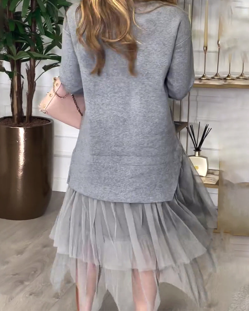 Langmouwige Jurk Met Hoge Hals En Patchwork