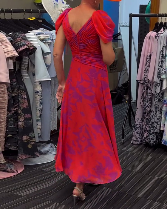 Geplooide jurk met split en print