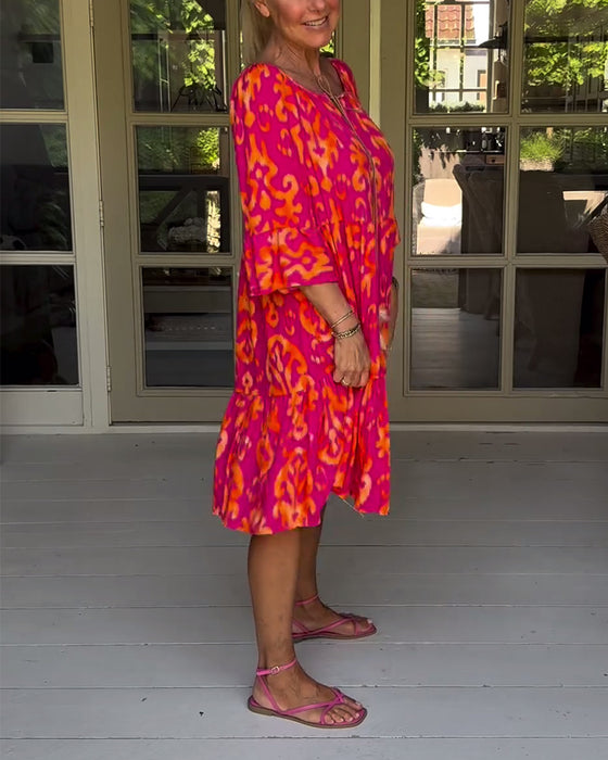 Jurk met losse print en klokmouwen