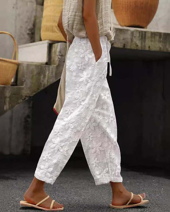 Effen casual broek met geborduurde bloemen en veters