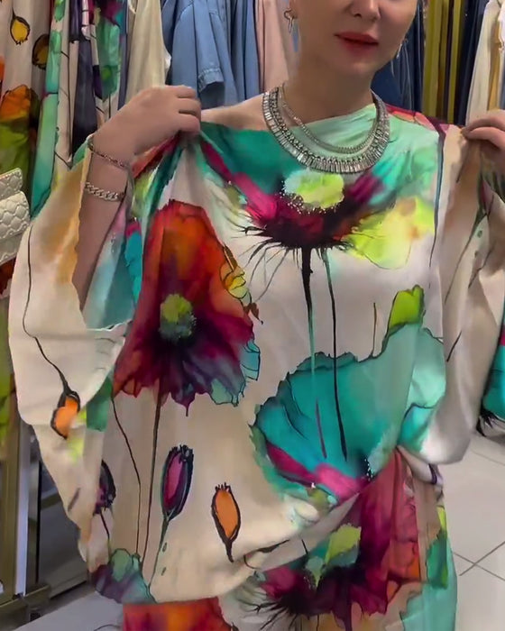 Set met driekwart mouwen met lotusprint en één schouder