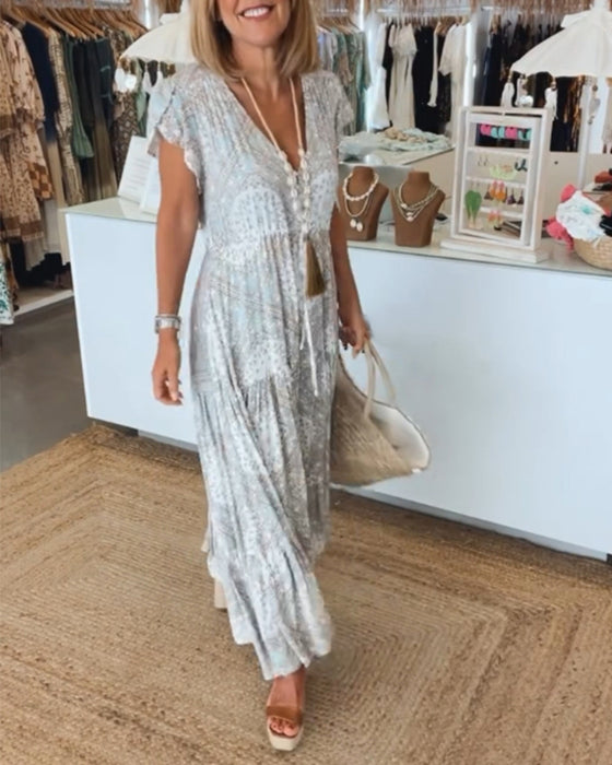 Jurk met V-hals en splitmouwen met vakantieprint