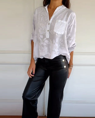 Elegante top in effen kleur met knoopzakje