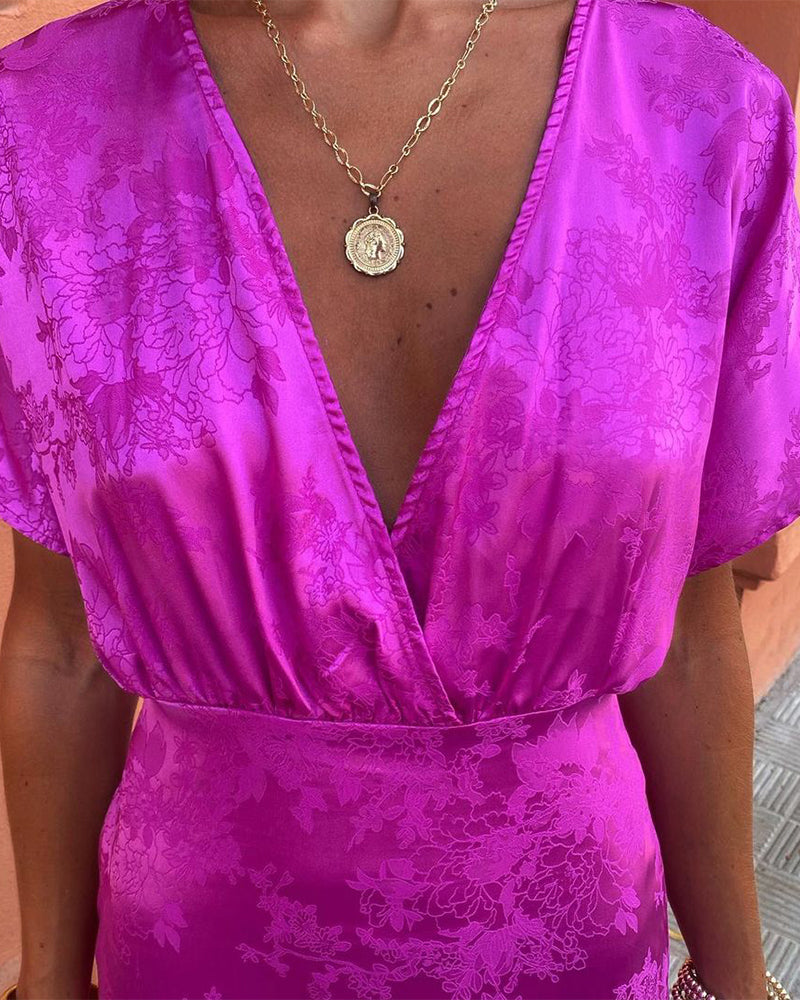 Elegante jurk met diepe V-taille, effen kleur