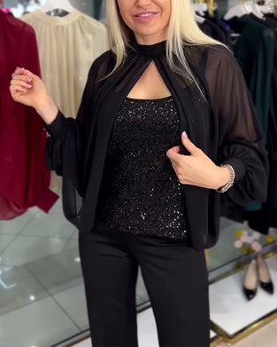 Blouse statement vleermuismouw pailletten