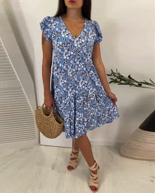 Mouwloze midi-jurk met V-hals en bloemenprint
