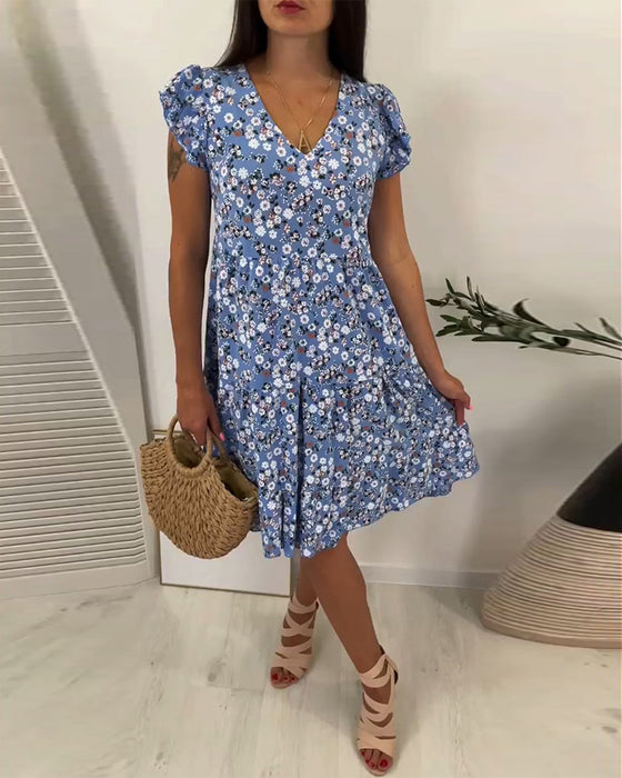 Mouwloze midi-jurk met V-hals en bloemenprint