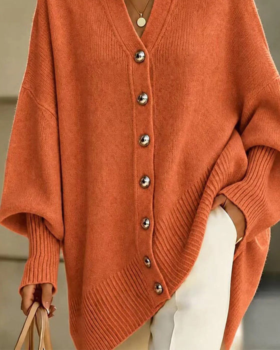 Ruimvallende cardigan met revers, V-hals en knopen