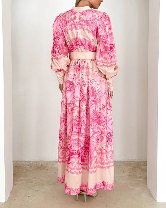 Jurk met knoopjesprint en lantaarnmouwen