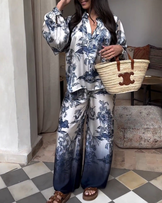 Tweedelig pak met plantverloopprint en lantaarnmouwen