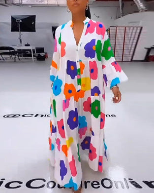 Kleurrijke casual jurk met bloemenprint en klokmouwen