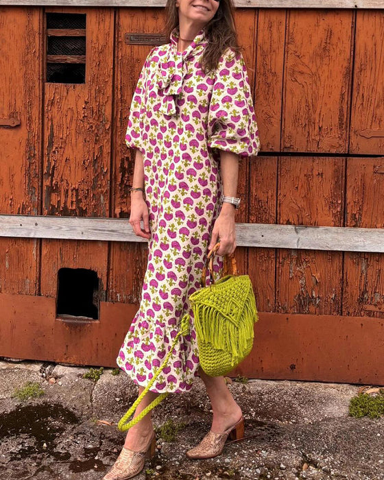 Elegante jurk met pofmouwen en print