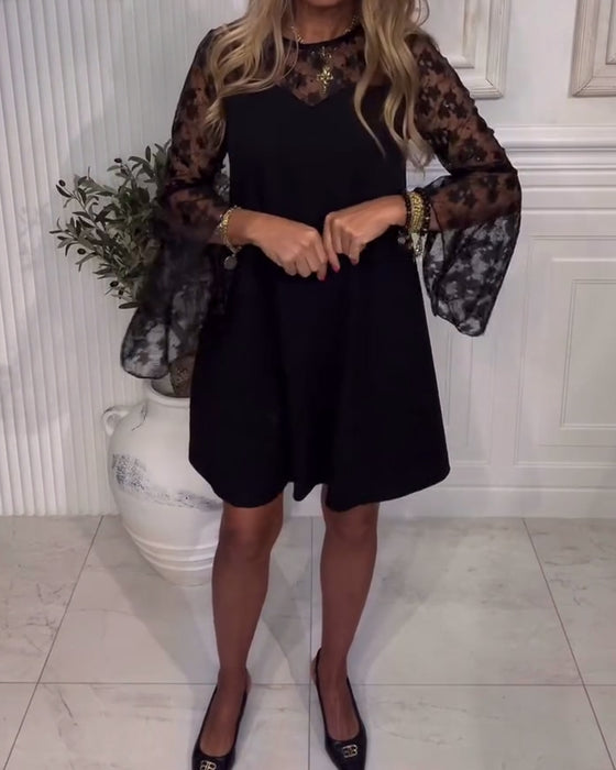 Effen Jurk Met Klokmouwen En Patchworkdetails