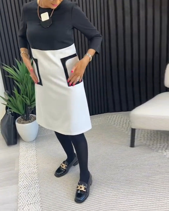 Casual contrasterende jurk met ronde hals en zak