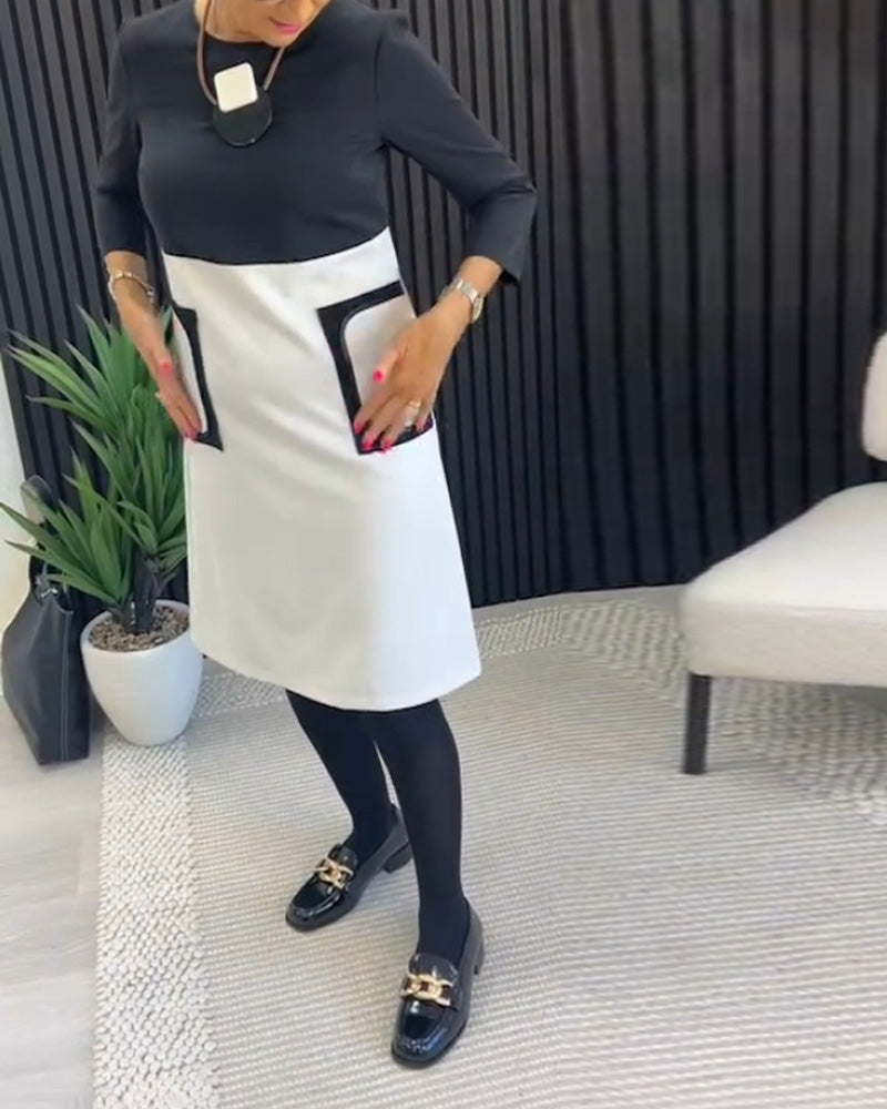 Casual contrasterende jurk met ronde hals en zak