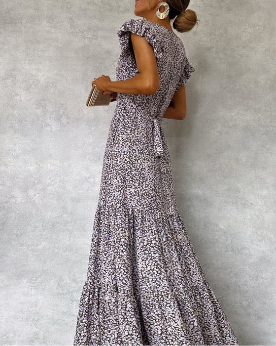 Elegante jurk met ruches aan de mouwen en split