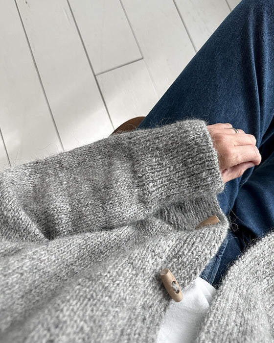 Opstaande kraag hoornen knoop effen kleur vest