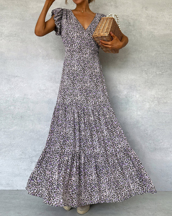 Elegante jurk met ruches aan de mouwen en split