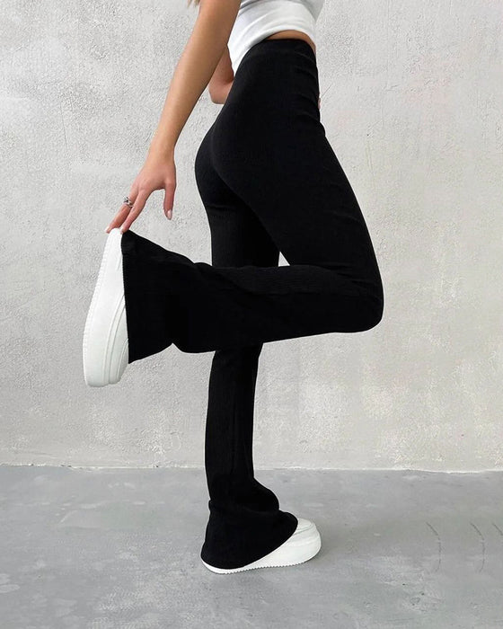 Effen gekleurde micro-flare slim-fit broek